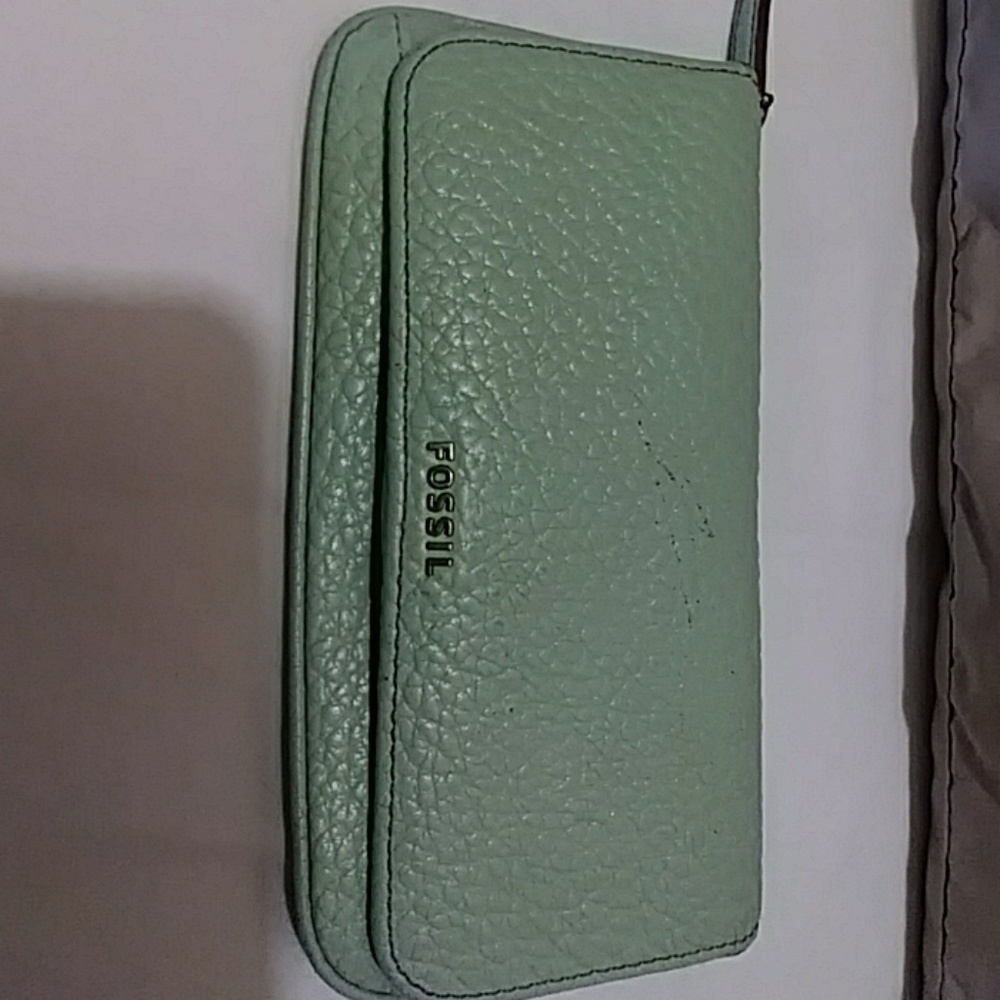 Fossil super light green wallet.